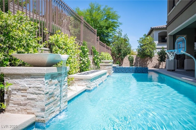 12018 Vento Forte Ave, Las Vegas, NV 89138 - view of swimming pool featuring fence