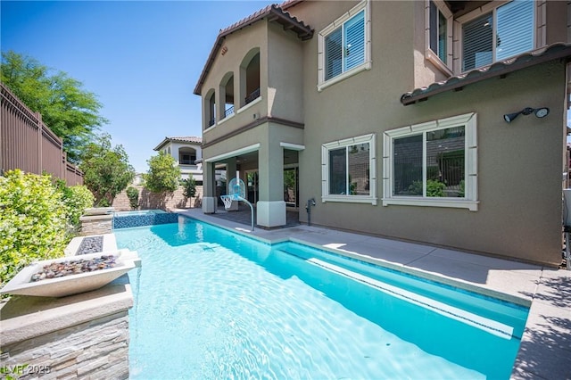 12018 Vento Forte Ave, Las Vegas, NV 89138 - view of swimming pool featuring a patio and fence