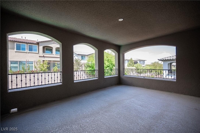 12018 Vento Forte Ave, Las Vegas, NV 89138 - unfurnished room featuring a textured ceiling