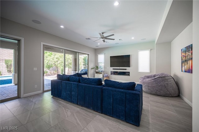 12018 Vento Forte Ave, Las Vegas, NV 89138 - living room with baseboards, ceiling fan, recessed lighting, and light tile patterned flooring