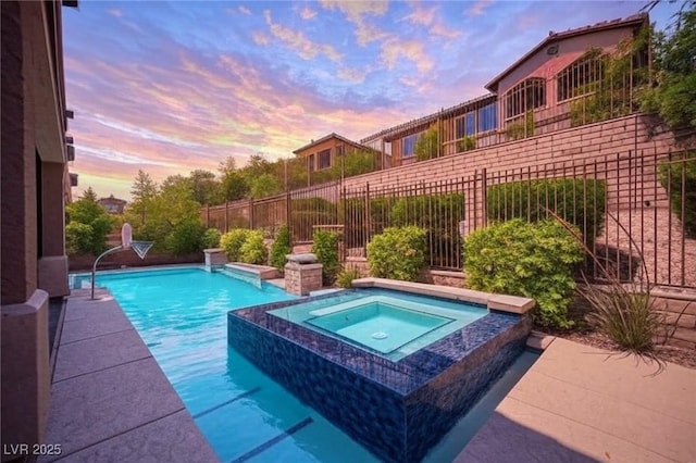 12018 Vento Forte Ave, Las Vegas, NV 89138 - view of pool with an in-ground hot tub and fence