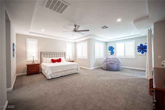 12018 Vento Forte Ave, Las Vegas, NV 89138 - carpeted bedroom featuring a raised ceiling, baseboards, a ceiling fan, and recessed lighting