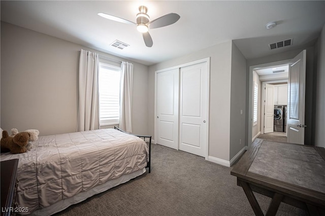 12018 Vento Forte Ave, Las Vegas, NV 89138 - bedroom featuring multiple windows, carpet flooring, a closet, and baseboards