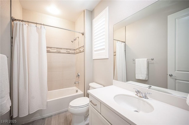 12018 Vento Forte Ave, Las Vegas, NV 89138 - full bathroom featuring wood finished floors, toilet, shower / bath combination with curtain, and vanity