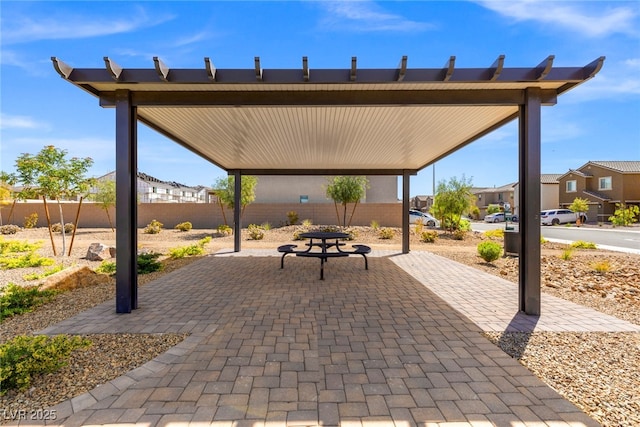 6234 Blood Lily Ave, Las Vegas, NV 89122 - view of patio / terrace with fence and a residential view