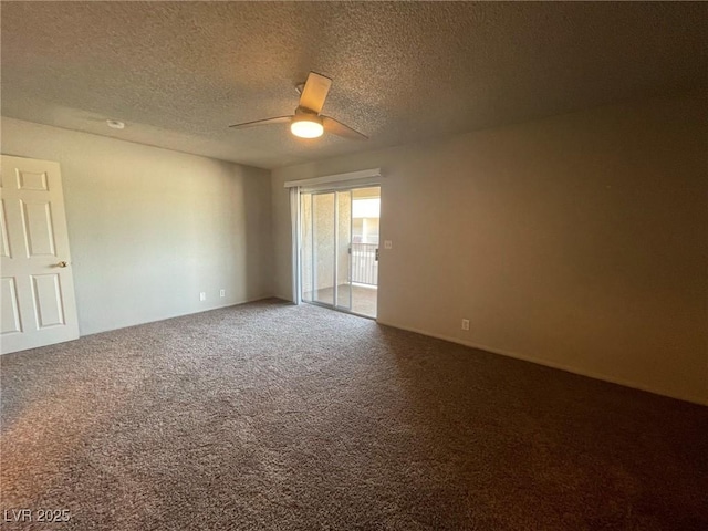 empty room with a ceiling fan, carpet flooring, and a textured ceiling