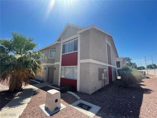 exterior space with stucco siding