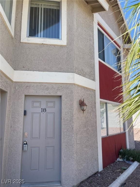 exterior space with stucco siding