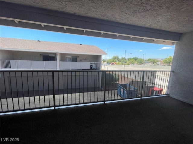 view of patio / terrace with a balcony