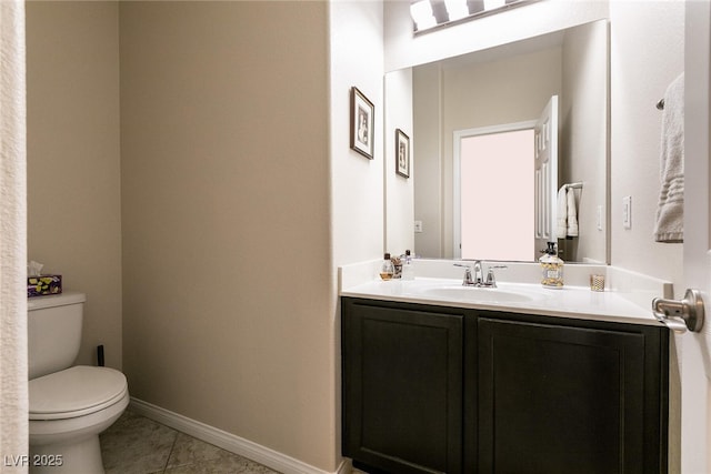 63 Via Di Mello, Henderson, NV 89011 - half bath with vanity, tile patterned flooring, toilet, and baseboards