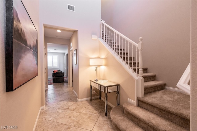 63 Via Di Mello, Henderson, NV 89011 - staircase featuring baseboards and tile patterned floors