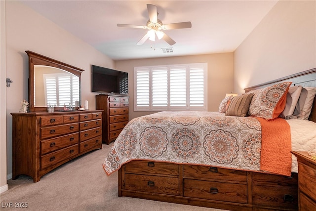 63 Via Di Mello, Henderson, NV 89011 - bedroom with light carpet and a ceiling fan