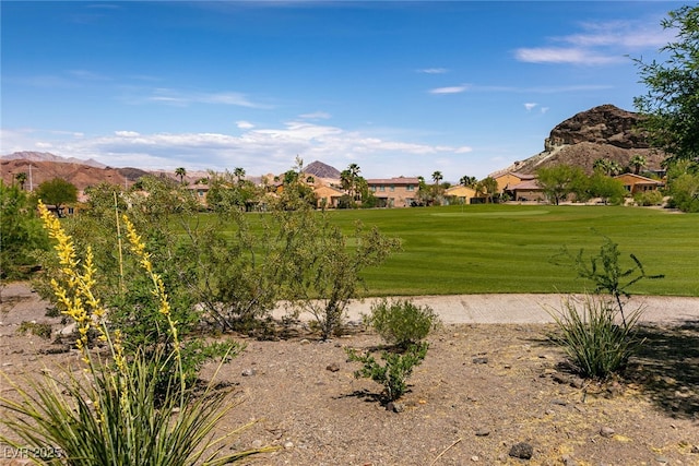 63 Via Di Mello, Henderson, NV 89011 - view of home's community featuring a residential view, a yard, and a mountain view