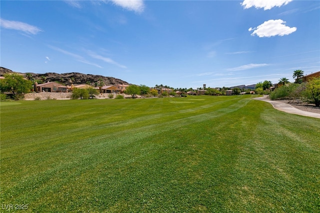 63 Via Di Mello, Henderson, NV 89011 - view of grassy yard featuring golf course view and a residential view