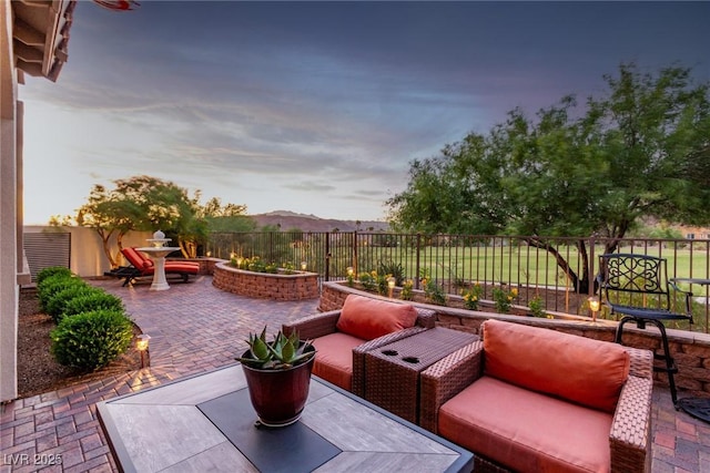 63 Via Di Mello, Henderson, NV 89011 - view of patio with a fenced backyard and outdoor lounge area