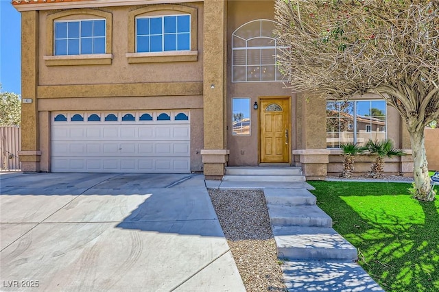 4 Bishopsgate Ter, Henderson, NV 89074 - view of front of property featuring an attached garage, concrete driveway, and stucco siding