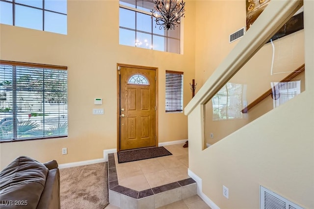 4 Bishopsgate Ter, Henderson, NV 89074 - tiled foyer entrance with a chandelier, baseboards, and a towering ceiling