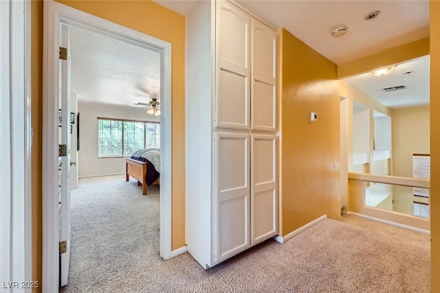 4 Bishopsgate Ter, Henderson, NV 89074 - corridor featuring light carpet and baseboards