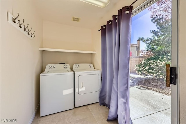 4 Bishopsgate Ter, Henderson, NV 89074 - laundry area with washer and dryer and light tile patterned floors