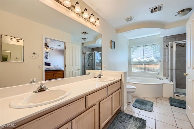 4 Bishopsgate Ter, Henderson, NV 89074 - full bathroom featuring a bath, connected bathroom, a shower stall, tile patterned flooring, and double vanity