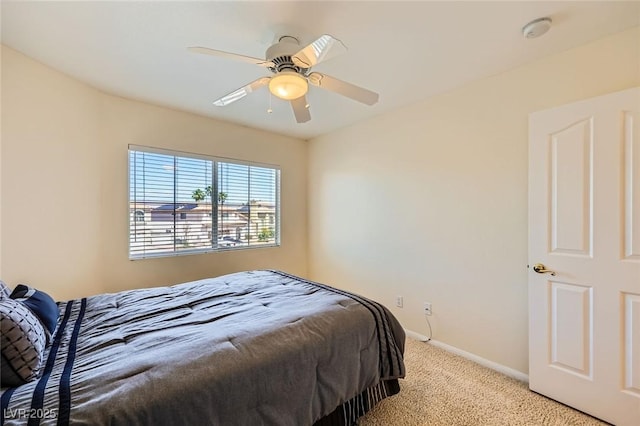 4 Bishopsgate Ter, Henderson, NV 89074 - bedroom with light colored carpet, baseboards, and ceiling fan