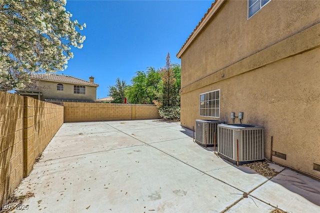 4 Bishopsgate Ter, Henderson, NV 89074 - view of patio with central AC and a fenced backyard