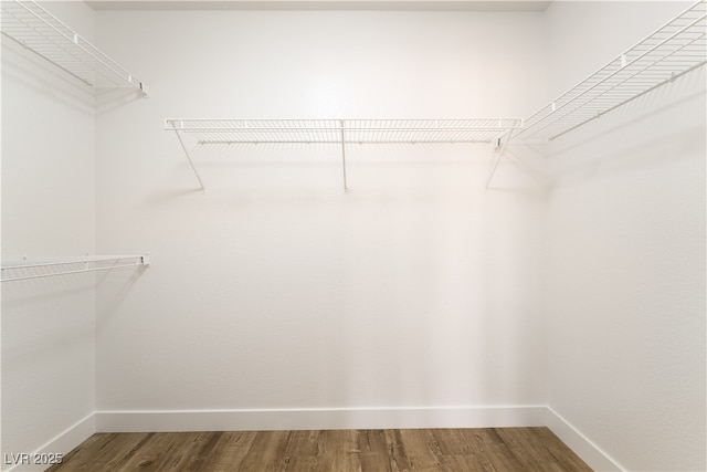 2505 Showcase Dr, Las Vegas, NV 89134 - spacious closet with wood finished floors