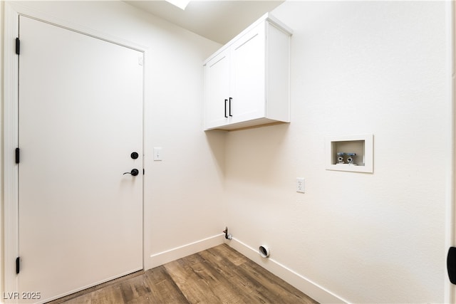 2505 Showcase Dr, Las Vegas, NV 89134 - laundry room featuring hookup for a washing machine, wood finished floors, baseboards, cabinet space, and gas dryer hookup