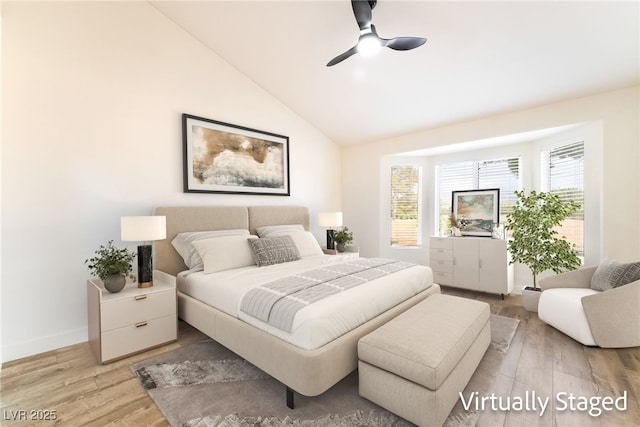 2505 Showcase Dr, Las Vegas, NV 89134 - bedroom with wood finished floors, vaulted ceiling, baseboards, and a ceiling fan