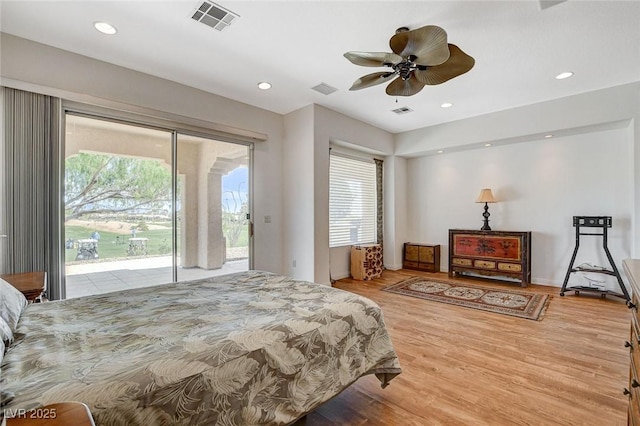 bedroom featuring access to outside, visible vents, wood finished floors, and recessed lighting