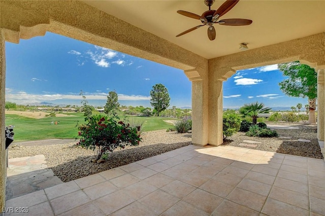 view of patio / terrace featuring ceiling fan