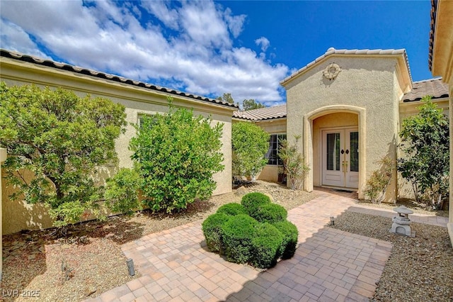 view of patio featuring french doors