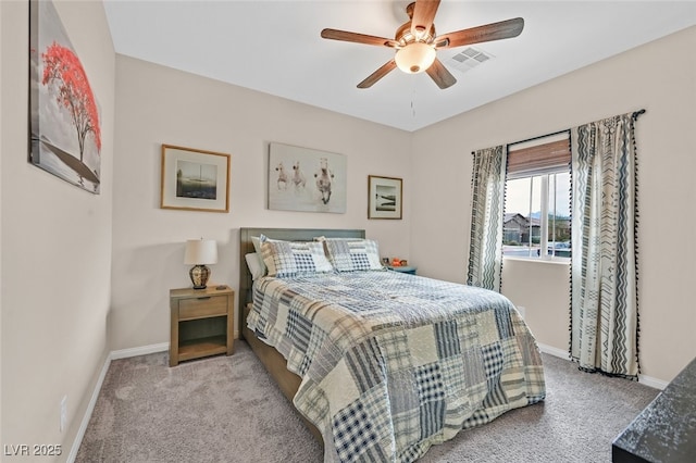 carpeted bedroom with a ceiling fan, baseboards, and visible vents