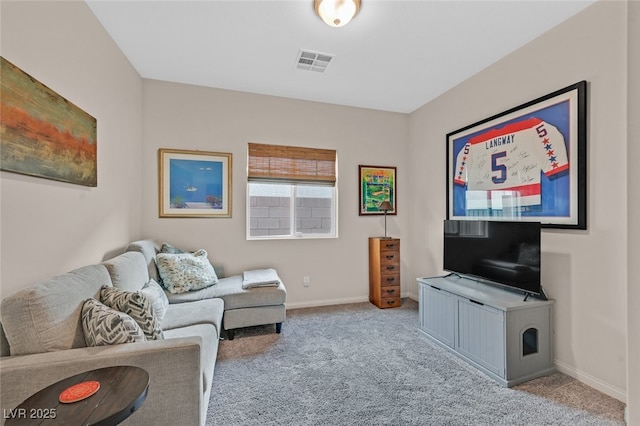 living area featuring carpet flooring, baseboards, and visible vents