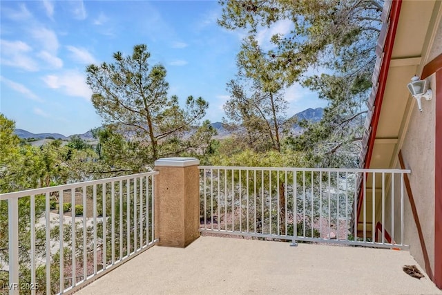 balcony featuring a mountain view