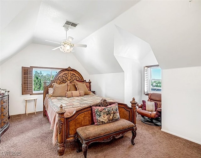 bedroom featuring multiple windows, carpet flooring, visible vents, and lofted ceiling