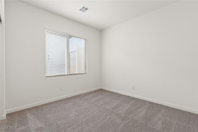 2739 Avril Point St, Las Vegas, NV 89156 - unfurnished room with baseboards, visible vents, and carpet floors