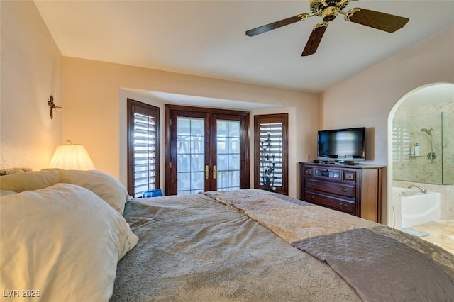 bedroom featuring access to outside, french doors, a ceiling fan, ensuite bathroom, and lofted ceiling