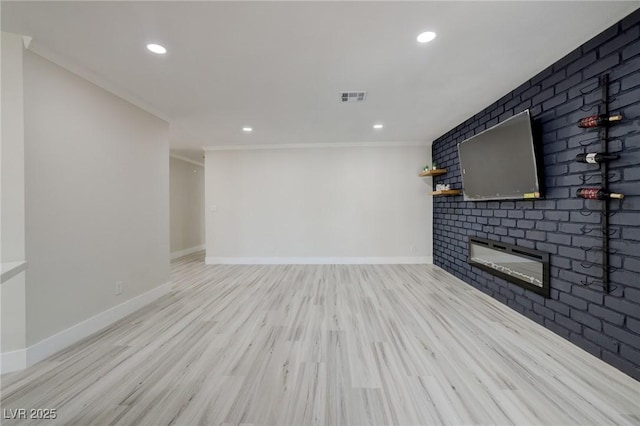 interior space featuring visible vents, recessed lighting, and a fireplace