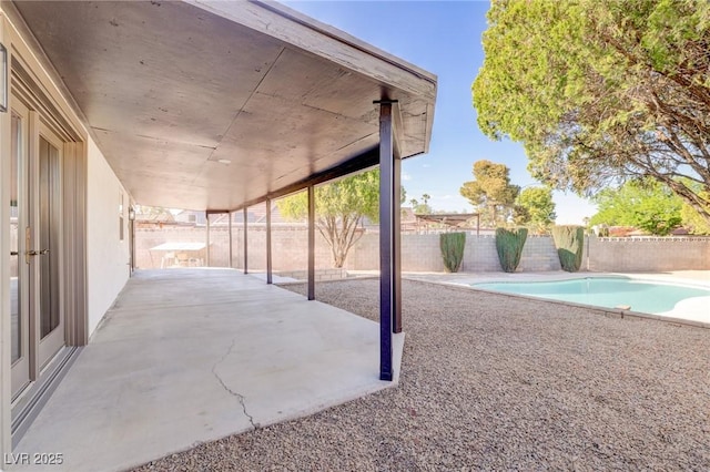 view of patio / terrace featuring a fenced in pool and a fenced backyard