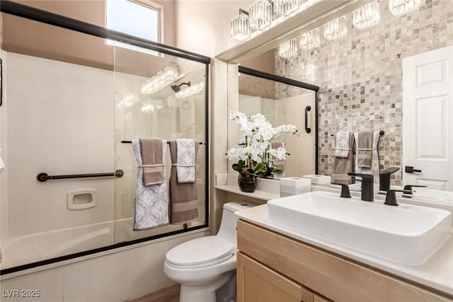 10713 Shoalhaven Dr, Las Vegas, NV 89134 - bathroom featuring enclosed tub / shower combo, toilet, and vanity