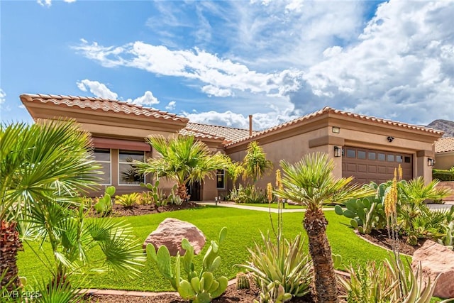 10713 Shoalhaven Dr, Las Vegas, NV 89134 - view of front of house featuring an attached garage, stucco siding, a front yard, and a tiled roof
