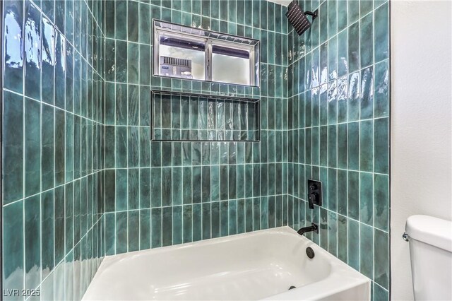 bathroom featuring toilet and shower / washtub combination