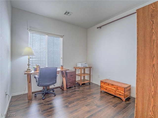 office space featuring wood finished floors and baseboards