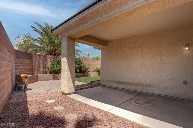 view of patio with a fenced backyard