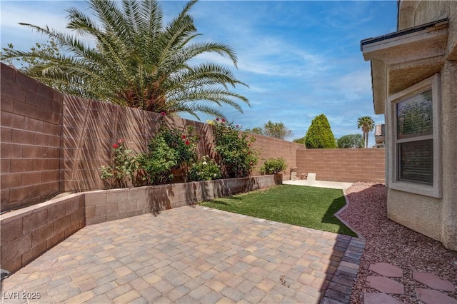 view of patio with a fenced backyard