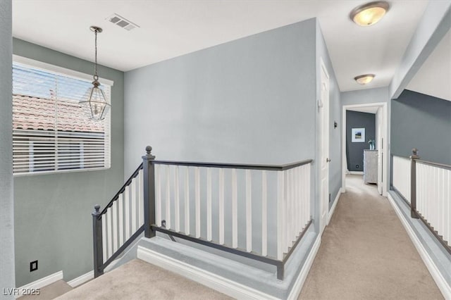 1861 Windward Ct, Henderson, NV 89012 - hall featuring baseboards, an upstairs landing, carpet flooring, and visible vents