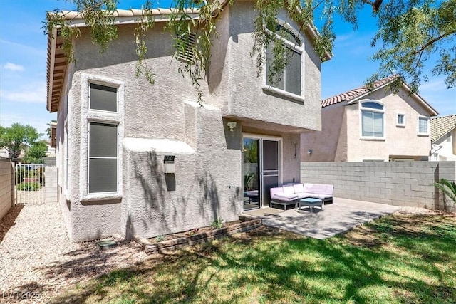 1861 Windward Ct, Henderson, NV 89012 - back of property with a patio, a fenced backyard, and stucco siding