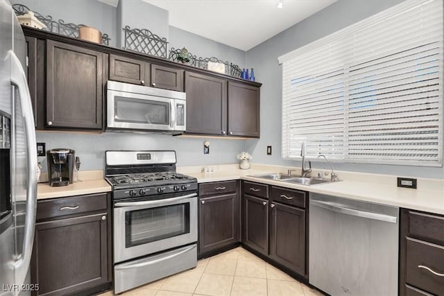 1861 Windward Ct, Henderson, NV 89012 - kitchen featuring a sink, dark brown cabinetry, and stainless steel appliances