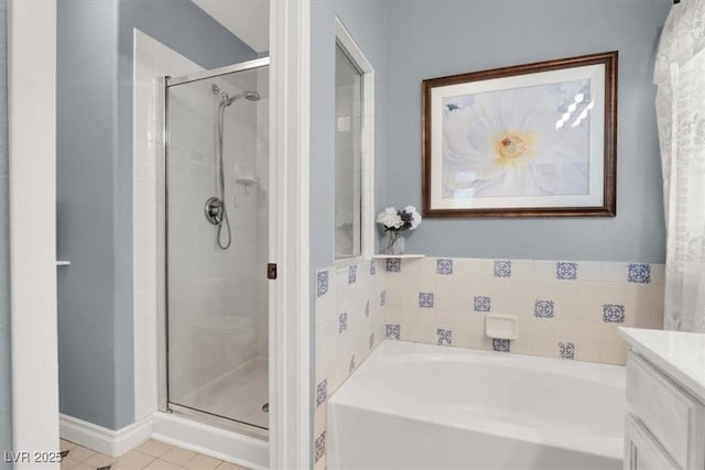1861 Windward Ct, Henderson, NV 89012 - full bathroom featuring vanity, tile patterned flooring, a shower stall, and a bath